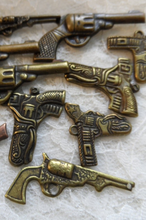 Vintage gold plate brass stamped and solid gun