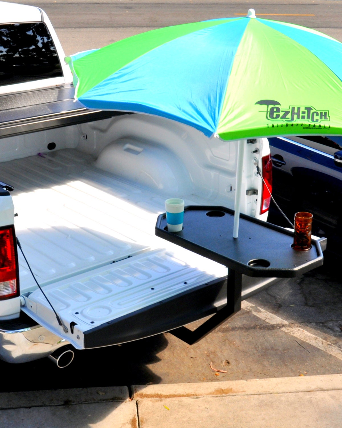 The EZ Hitch Tailgate Table is a trailer hitch supported table