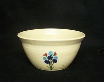 Soup or cereal bowl, stoneware pottery in a creamy white glaze with bouquet of blue, turquoise and red flowers, 3.5x6.75 inches
