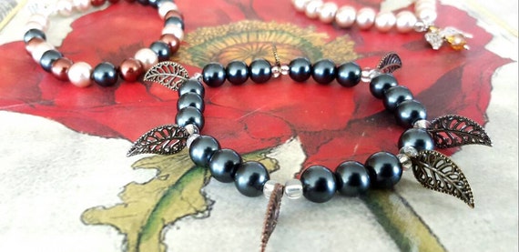 kelaine - Assorted bead bracelets with charms