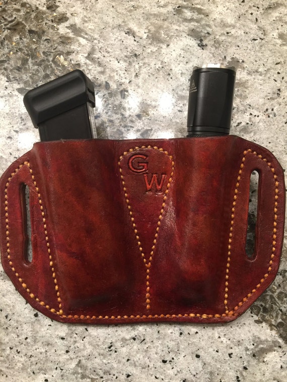 Leather Magazine Flashlight holster.