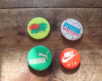 Retro sports brand pin badges