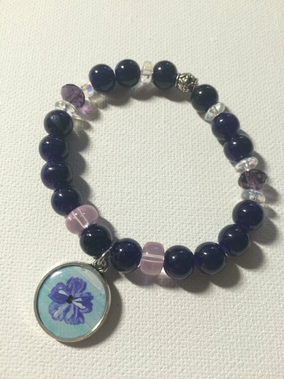 Flower Charm Bracelet. TWO sided charm on by PaintedSeaJewelry