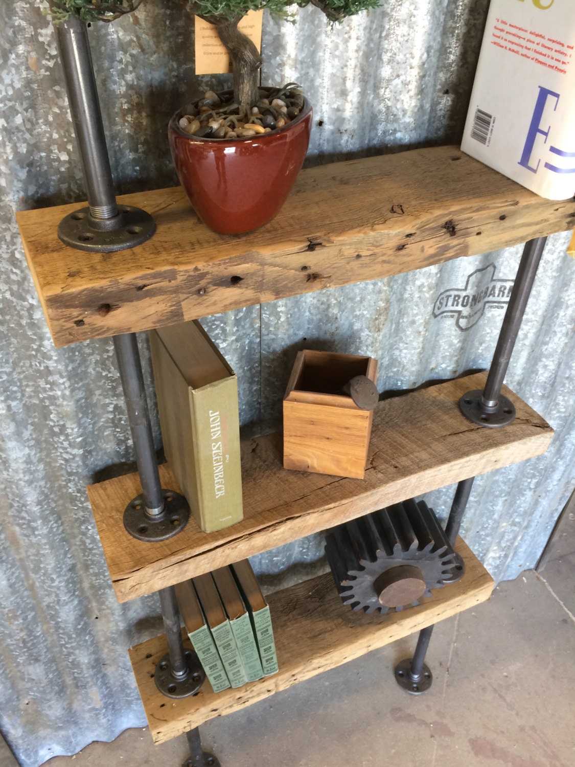 Reclaimed Wood and metal pipe bookcase Pipe by Prairiewoodworking