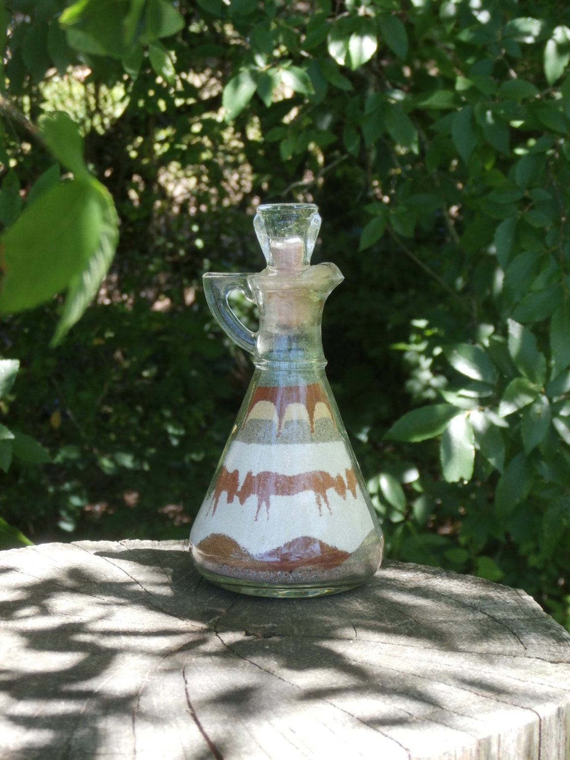 Antique sand art bottles