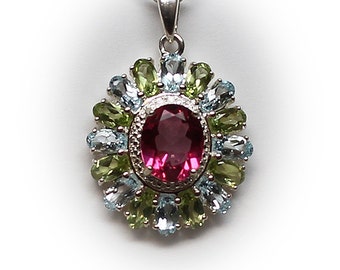 Lovely Sterling Silver Medallion Pendant with Pink Sapphire Center Stone accented with Aquamarine and Peridot