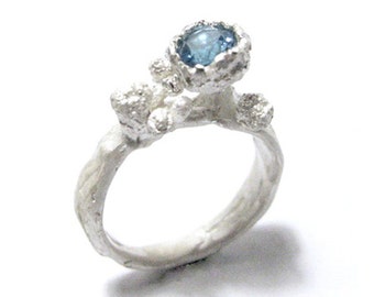 Secret garden ring with ocean blue topaz