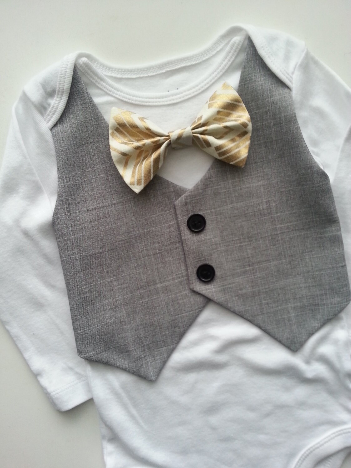 Baby Boy Bodysuit With A Grey Vest Attached and An Ivory Gold