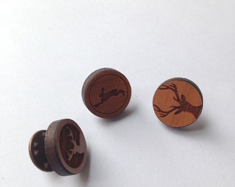 brooch made of wood with encrusted deer (bright, dark deer)