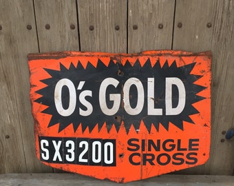 Vintage metal sign. O's gold metal advertising sign, farm advertising