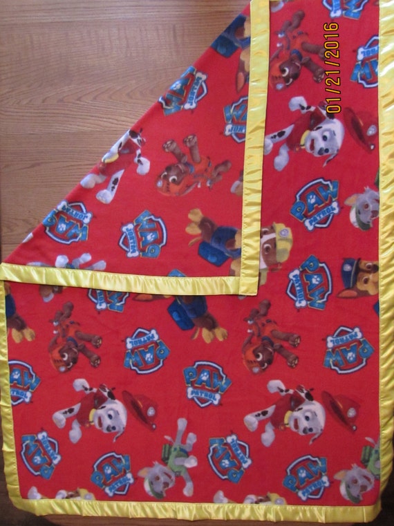 Paw Patrol fleece blanket with yellow satin edge sizes baby, toddler, oversize toddler and twin