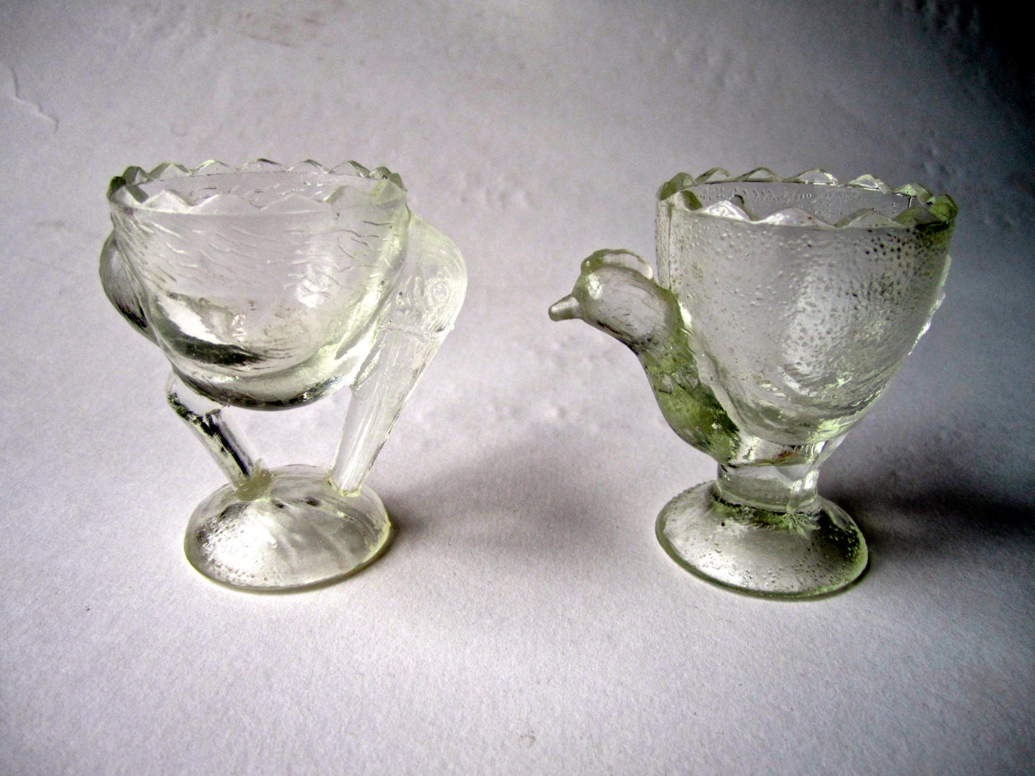 1950s French pressed glass novelty egg cups, chicken and pelican