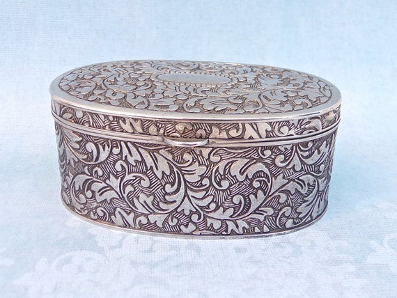 Embossed Metal Trinket Jewellery Box Lined with Red Fabric