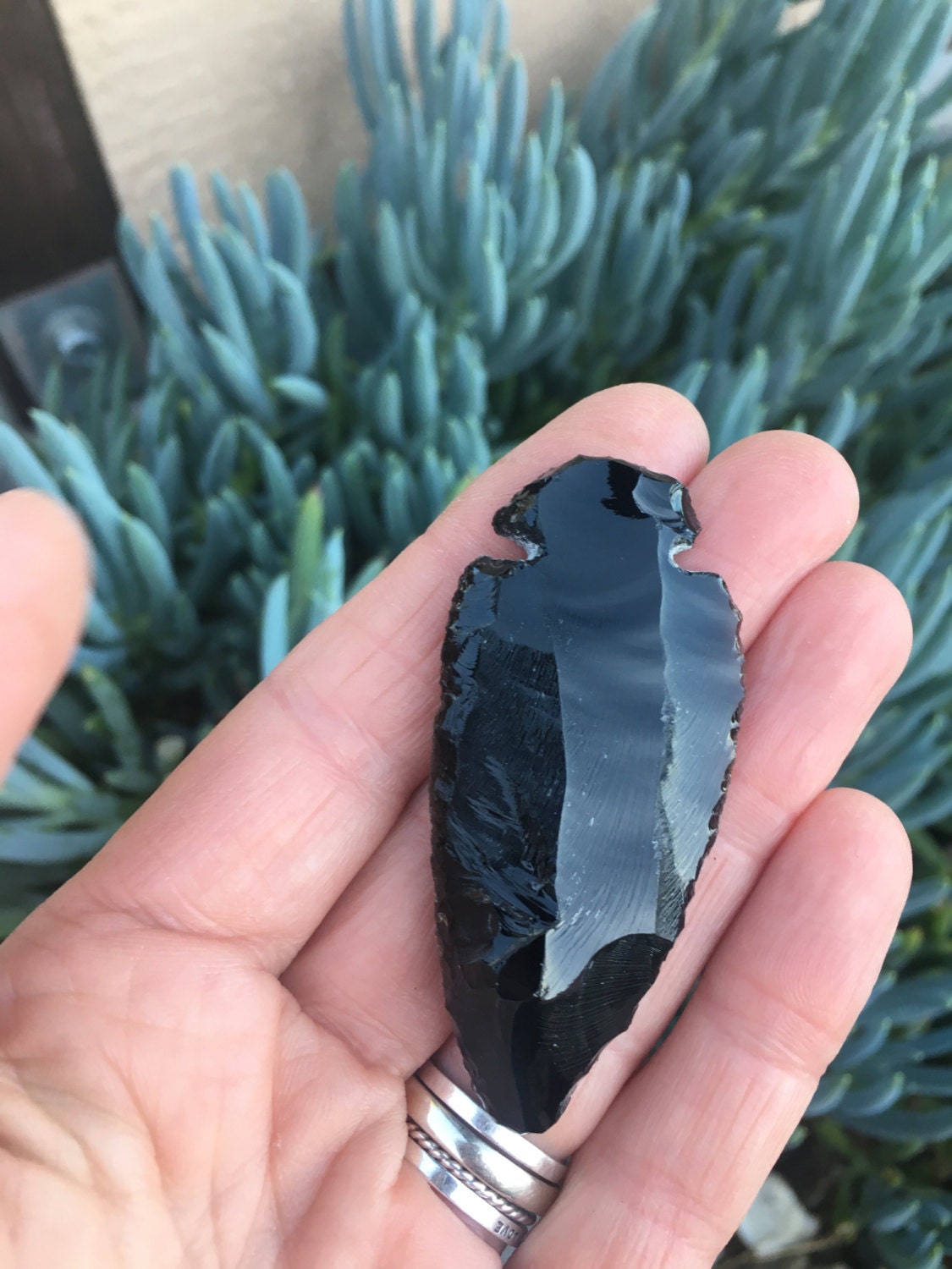 black obsidian crystal arrowhead