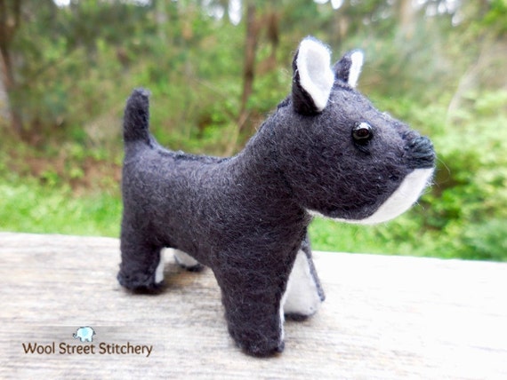 black and white stuffed dog toy