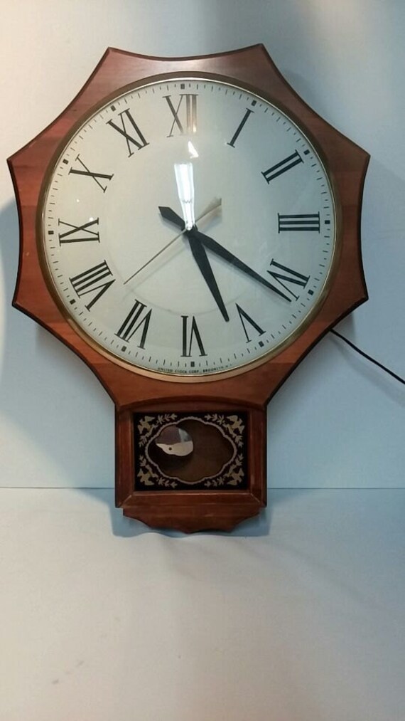Items similar to United Clock Corp Model 597 Electric Wall Clock on Etsy
