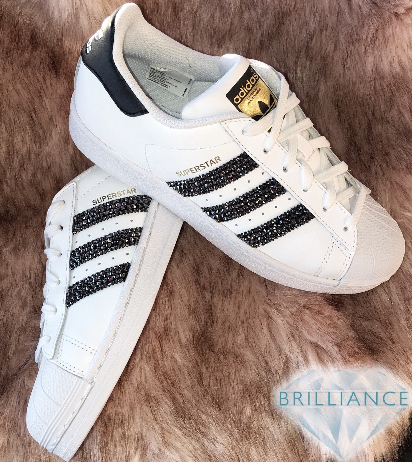 white sneakers with stripes