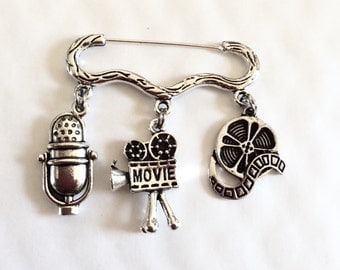Film lover Movie magic cinema film microphone camera charm silver tone brooch/pin