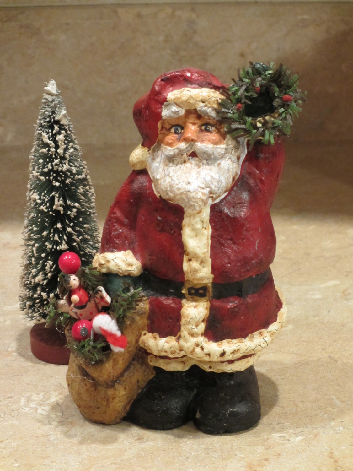 paper mache santa holding wreath w bag of christmas decor paper mache santa holding wreath w bag of christmas decor