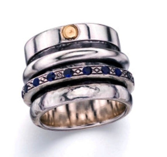 Spinner ring with gemstones
