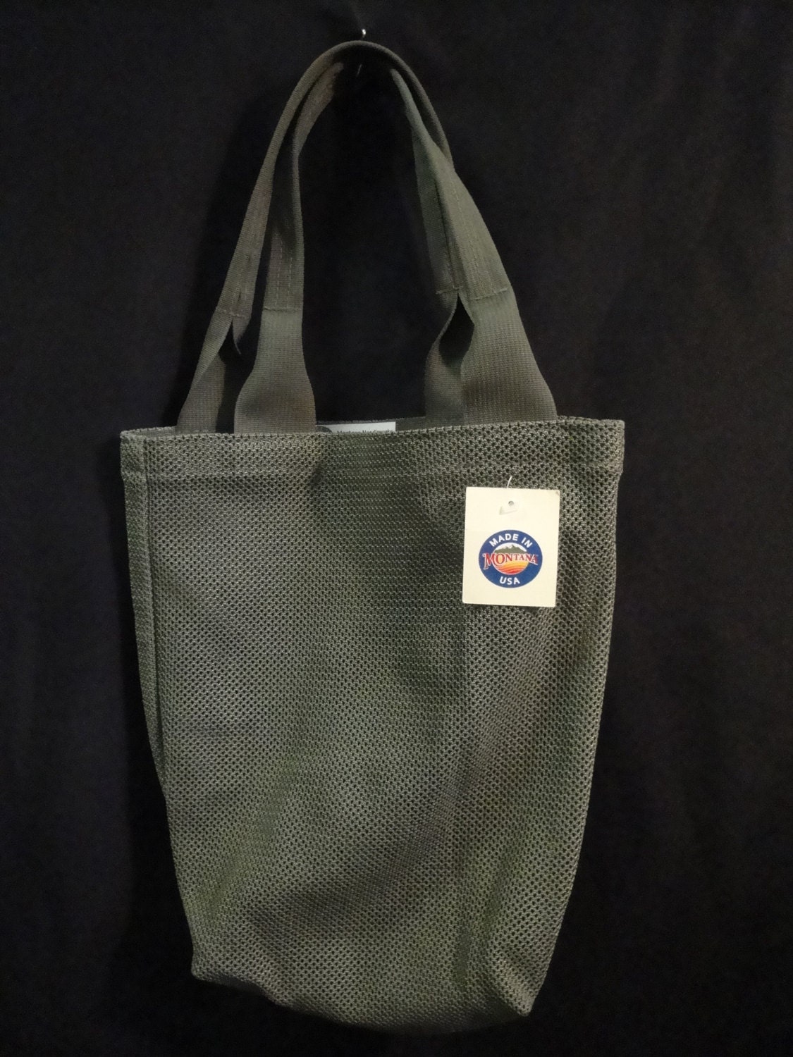 green nylon tote bag