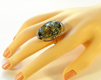Natural Baltic green amber ring.
