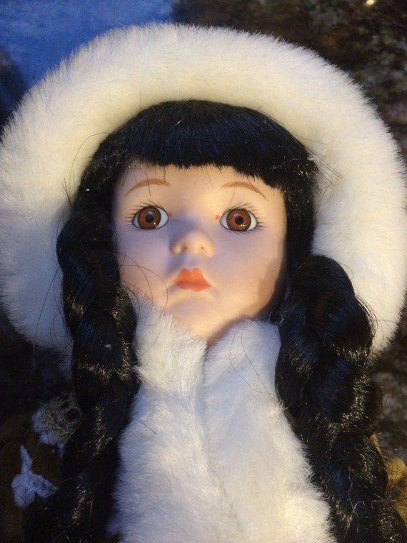 porcelain eskimo doll