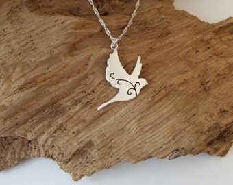 Sterling silver dove with scroll detail