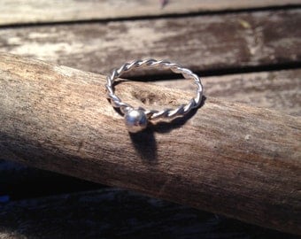Twisted ring with silver ball