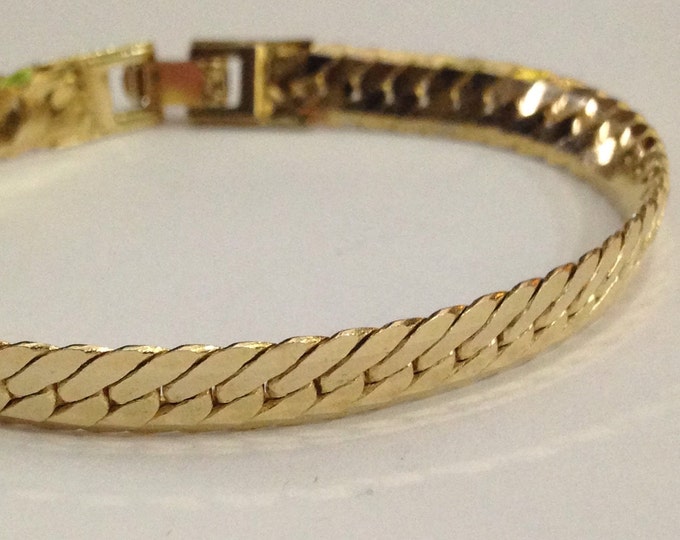 Storewide 25% Off SALE Vintage Gold Tone Herringbone Woven Designer Bracelet Featuring Hidden Clasp Design Closure