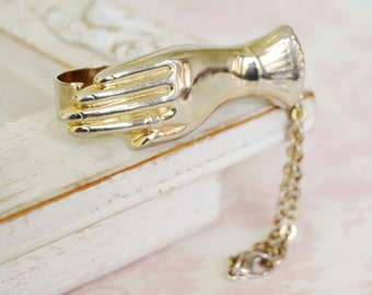 Vintage Glove Clip in Gold Metal and in the Shape of a Hand