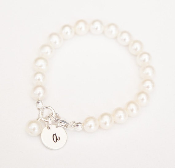 Items similar to hand stamped baby charm bracelet, Initial bracelet ...