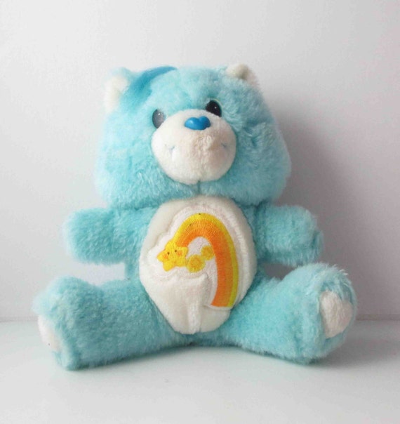 small stuffed care bears