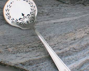 International Sterling Tomato Server in the Minuet Pattern