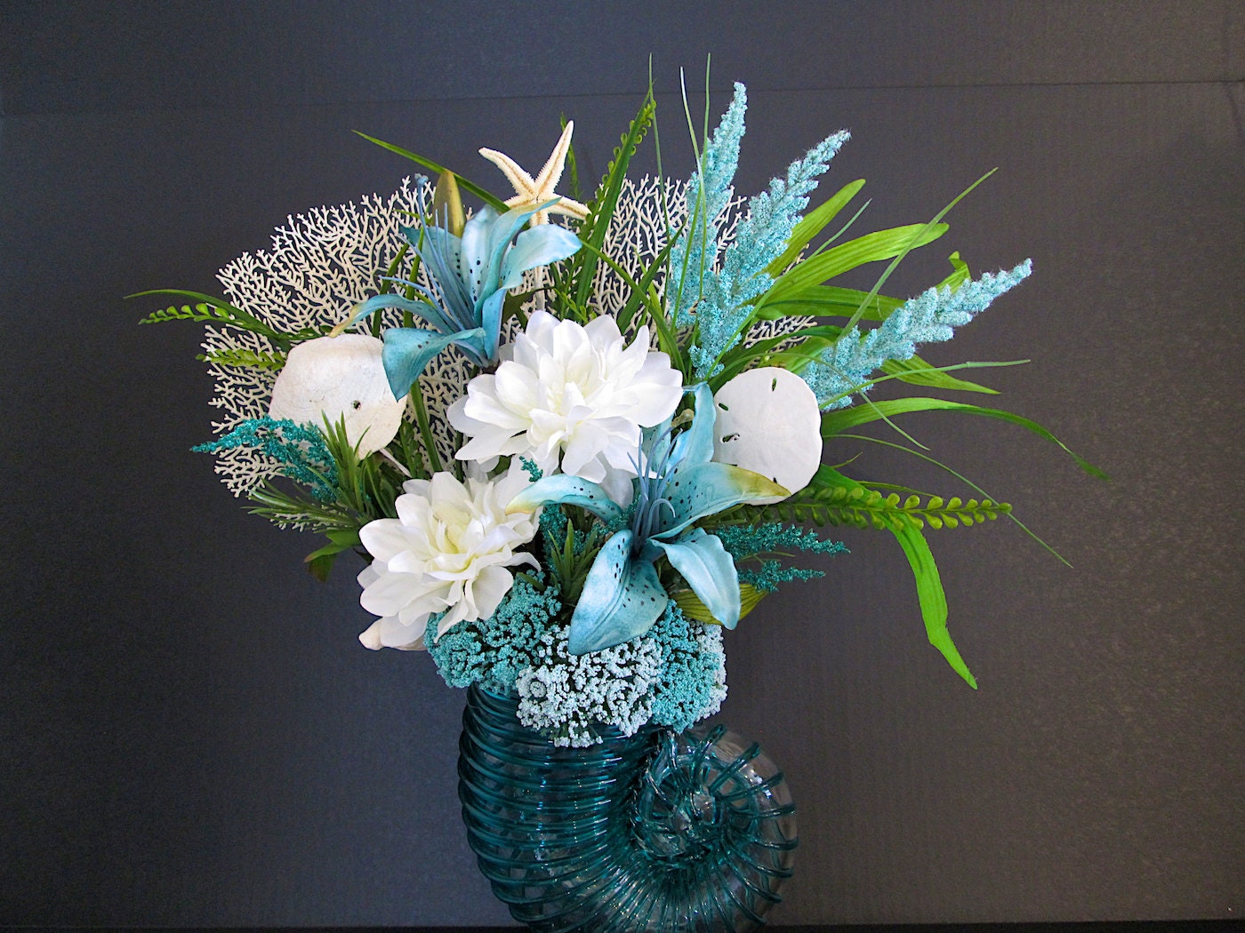 Silk Flower Arrangement in an Aqua Colored Glass Seashell