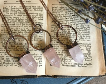 rose quartz crystal necklace meaning