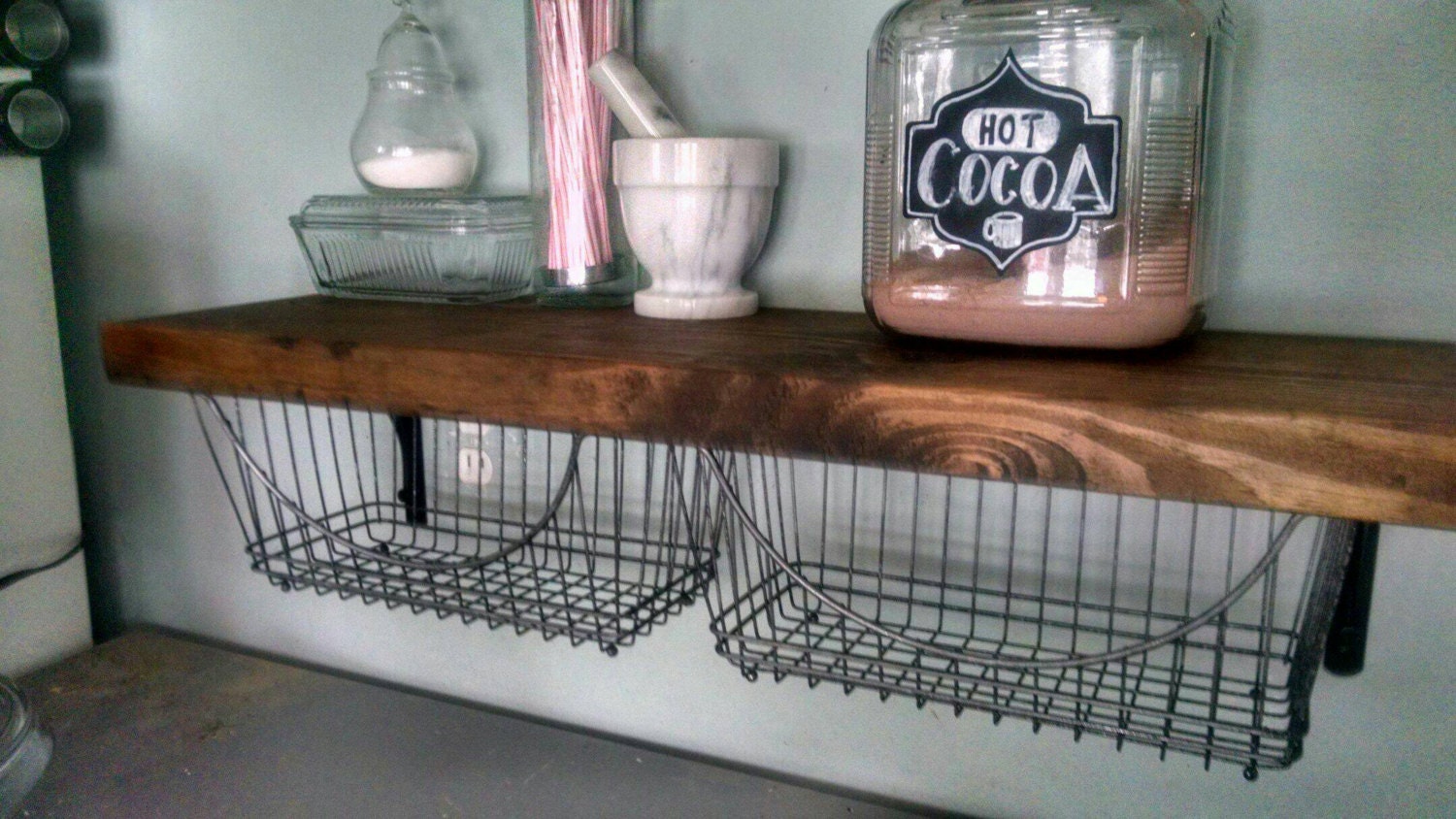 Wood plank shelf with vintage style wire baskets by BlackSheepHome