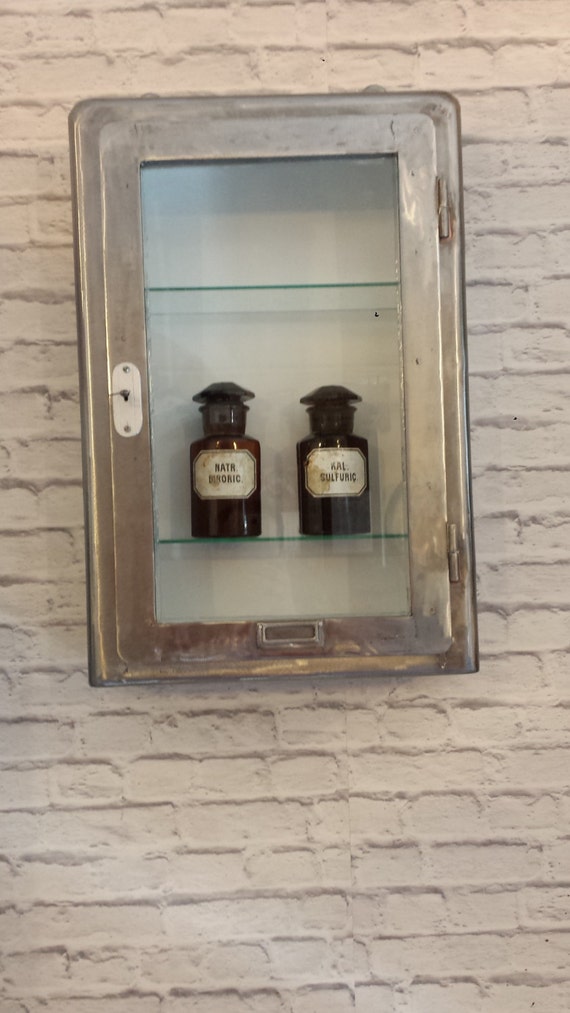 hanging medicine cabinet on drywall
