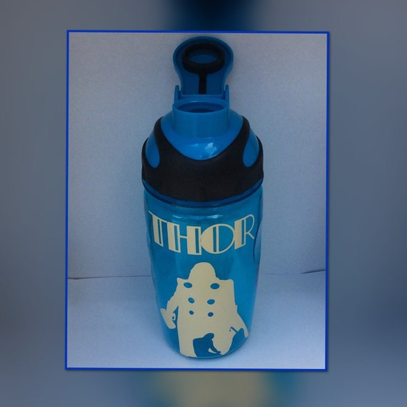 Items similar to Thor silhouette with his hammer. Personalized water