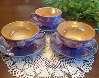 Hand painted Lustreware teacups and saucers
