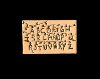 Glow Stranger Things Enamel Pin