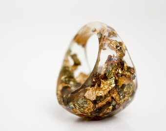 clear size 7 soft faceted eco resin ring with suspended metallic flakes