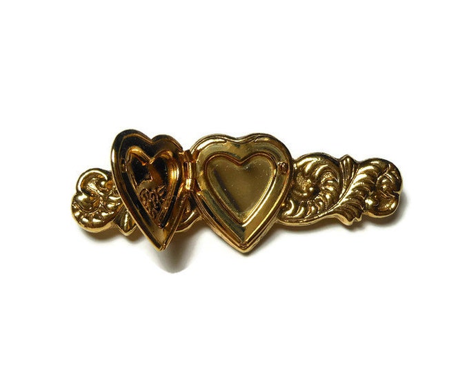 1928 heart locket brooch, gold heart locket bar bin with a star and flowers etched on the front