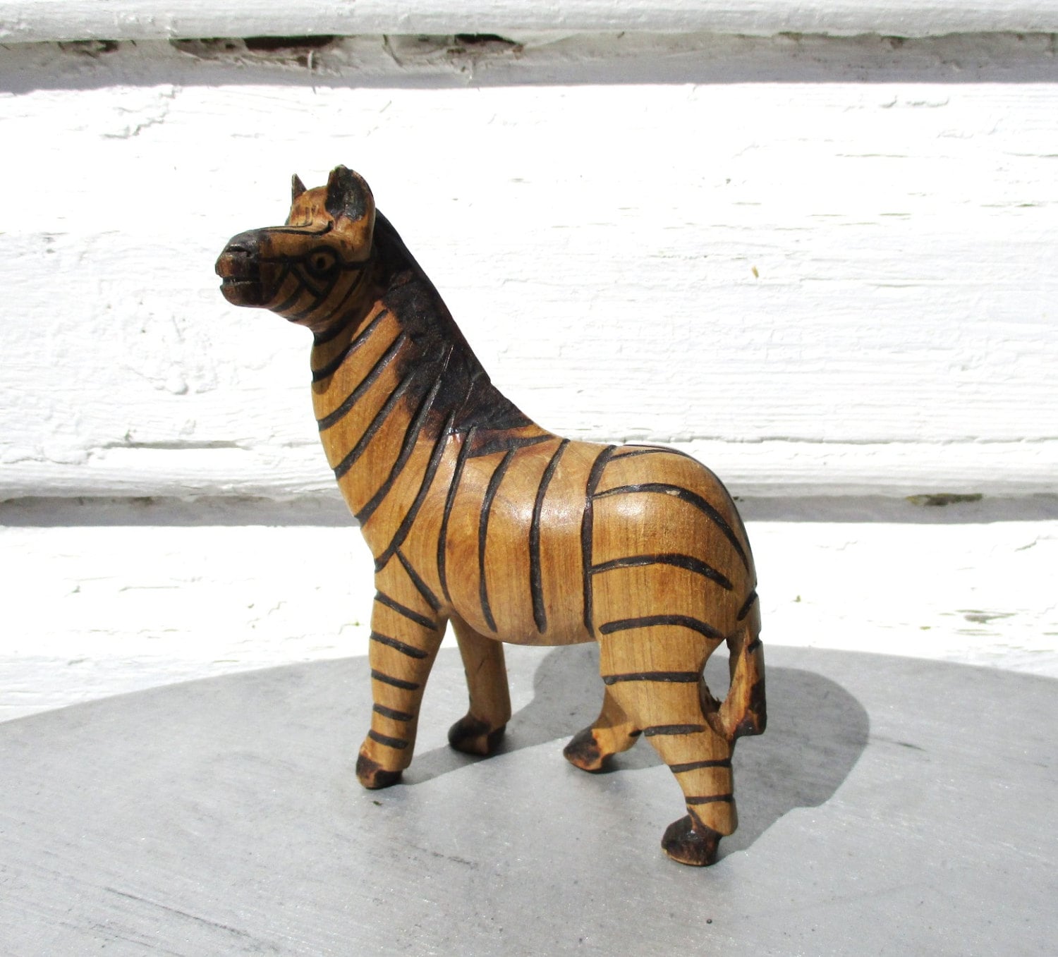 tall wooden zebra statues