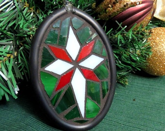 Handmade Christmas star suncatcher / ornament (red and green)