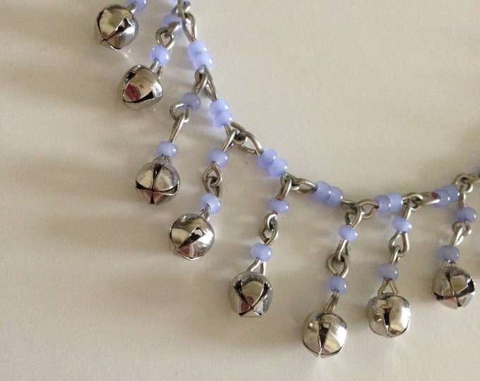 purple and silver bell necklace