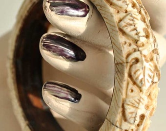 Vintage carved ox bone bangle