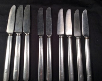 Set of 9 US Army Stainless Steel dinner knives from 3 different Makers marks. Vintage Collection