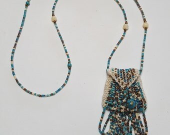 The Brigitte, a bead knit necklace purse amulet bag in browns and turquoise