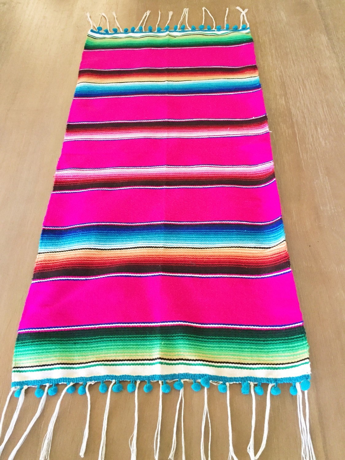 Mexican Serape table runner with Pom pom details by MesaChic